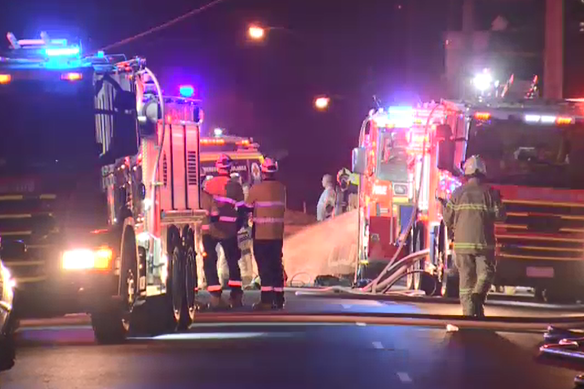 Firefighters work to put out the blaze at the factory. 