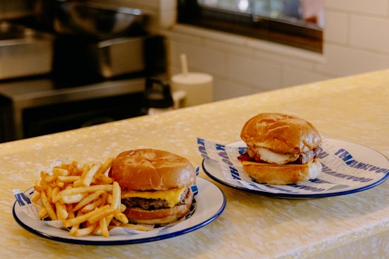 Tuckshop Coffee serves cheeseburgers and bacon and egg rolls.