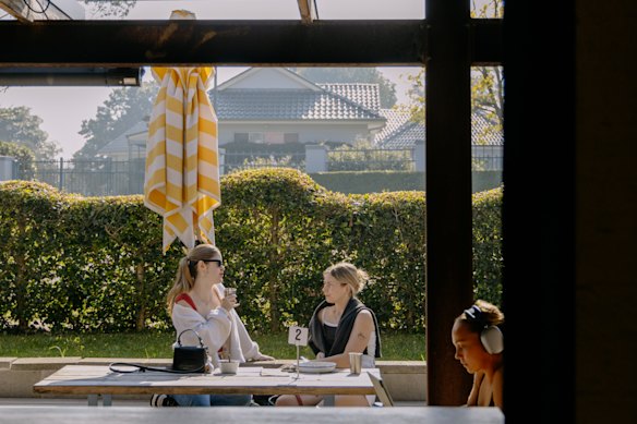 Sunny outdoor dining at Tuckshop, Glenhaven.