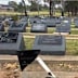 Police are investigating the desecration of Islamic graves at a south-west Sydney cemetery.