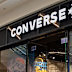 Converse has pulled an advert that critics compared with imagery from the Ku Klux Klan,