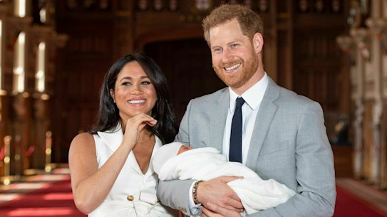 Britain's Prince Harry and Meghan, Duchess of Sussex, during a photocall with their newborn son, in St George's Hall at Windsor Castle, Windsor, south England, Wednesday May 8, 2019. Baby Sussex was born Monday at 5:26 a.m. (0426 GMT; 12:26 a.m. EDT) at an as-yet-undisclosed location. An overjoyed Harry said he and Meghan are "thinking" about names. 