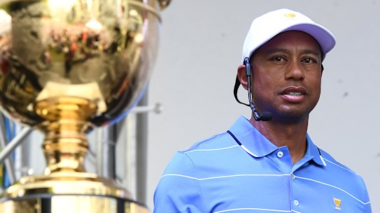 Tiger Woods with the Presidents Cup in Melbourne on Monday evening.