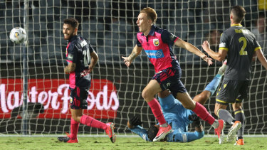 Matthew Hatch celebrates his goal - the fastest debut strike in A-League history - on Monday night.