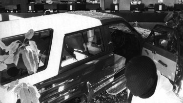 The bank’s security camera caught a glimpse of the balaclava-clad robber.