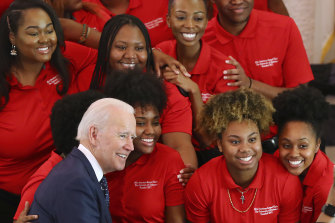 Democratic presidential candidate and former vice-president Joe Biden takes a picture with the choir at the Brown Chapel African Methodist Episcopal Church in Selma, Alabama.