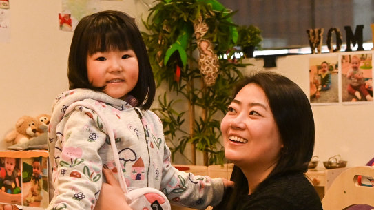 Sylvie Wang and her mother, Savannah Sun, at Kids on Collins childcare centre.