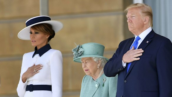 Melania Trump with her husband Donald Trump and the late Queen during a 2019 Buckingham Palace visit. 
