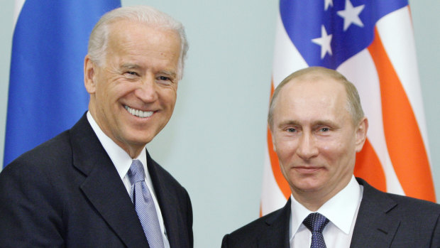Joe Biden, and Vladimir Putin in Moscow, Russia in 2011. 