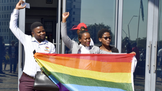 Activists celebrate outside the High Court in Gaborone, Botswana, after the country became the latest country to decriminalise gay sex.