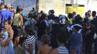 People seek information about family members who are prisoners after a riot inside the Regional Recovery Centre in Altamira, Brazil.