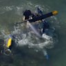 Three people were rescued after their helicopter plunged into the ocean.