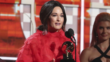 Kacey Musgraves accepts her Grammy for Album of the Year.