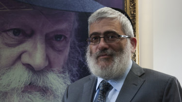 Then rich-lister Rabbi Joseph Gutnick in his Melbourne office in 2013. Behind him is a portrait of the Lubavitcher Rebbe, Menachem Mendel Schneerson.