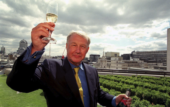 Terence Conran celebrates the opening of his new restaurant "Coq d'Argent" in London, 1998.