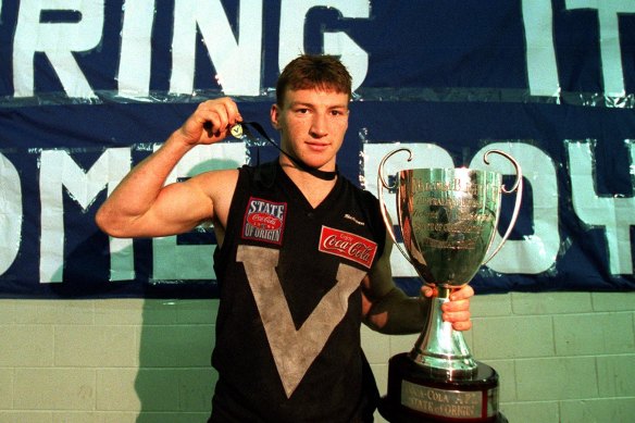 Brent Harvey with the E.J Whitten Medal after the State of Origin match between Victoria and South Australia in 1999.