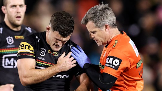 Nathan Cleary leaves the field with a shoulder injury.