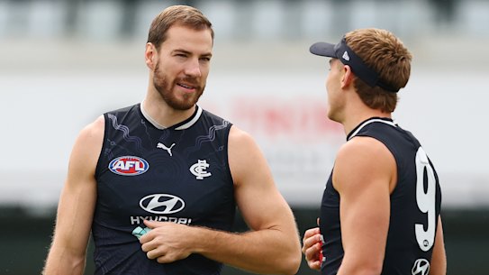 Harry McKay at training with Carlton skipper Patrick Cripps.