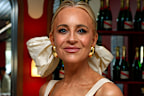 Carrie Bickmore is all smiles at the 2026 Derby Day.