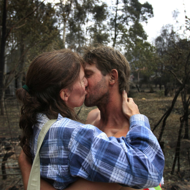 Jennifer Wood and her partner Mark are reunited after the Black Saturday bushfires.