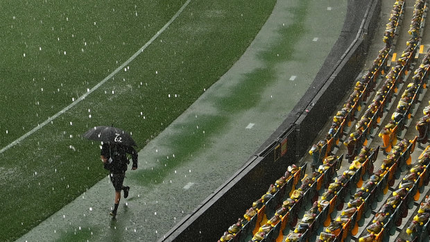 Heavy rain hits Brisbane before the 2020 AFL grand final in October.
