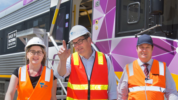 Premier Daniel Andrews and Public Transport Minister Jacinta Allan with a new VLocity train on Monday.