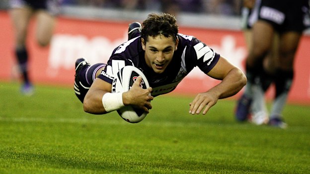 Flying high … Billy Slater scores a try against the Warriors in 2008.
