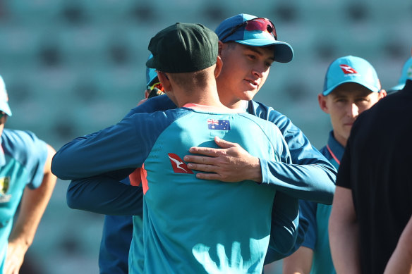 Todd Murphy and Matthew Renshaw hug after the former was capped to make his Test debut for Australia in Nagpur.