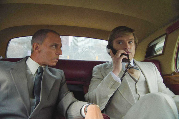 Jeremy Strong, left, as Roy Cohn, the lawyer who takes a young Donald Trump (Sebastian Stan) under his wing and grooms him.