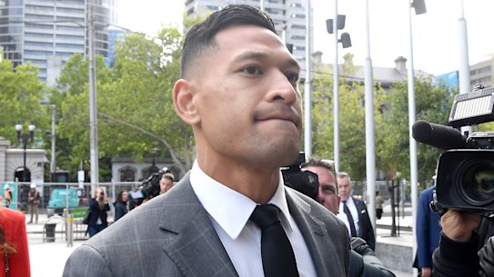 Rock and a hard place: Israel Folau could have trouble finding a football contract in Australia. 