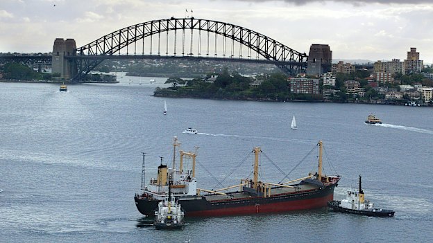 The North Korean drug-running vessel the Pong Su being brought into Sydney Harbour under police guard in 2003.