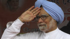 Then Indian prime minister Manmohan Singh greets a crowd in the northeastern state of Assam in 2014.