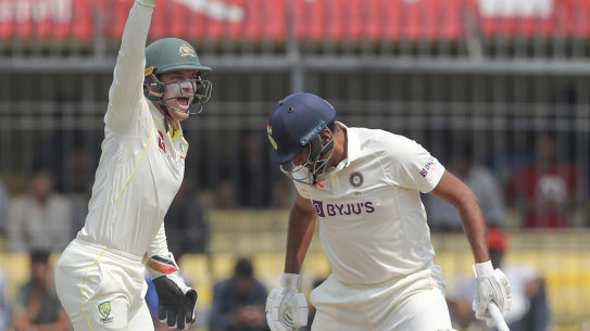 Alex Carey catches Ravichandran Ashwin in Indore.