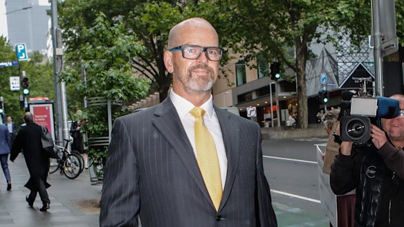 Simon Overland in 2019, outside the royal commission into the use of Nicola Gobbo as a police informer.