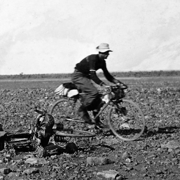 Jack Fahey rides across gibber plains between Adelaide and Darwin during his record attempt in 1914 with Ted “Ryko” Reichenbach.
