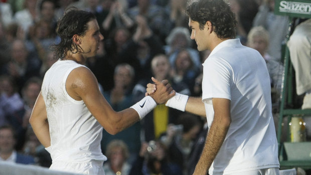Switzerland's Roger Federer (right) congratulates Rafael Nadal after the Spaniard won the 2008 men's Wimbledon title.