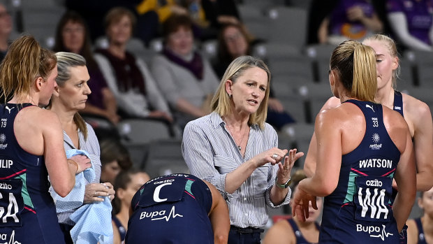 Head coach Simone McKinnis (centre) with her top-of-the ladder Melbourne Vixens.