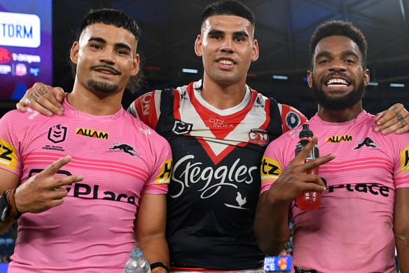 Taylan and Terrell May, along with Sunia Turuva (right), after the Panthers and Roosters clashed in round 4.