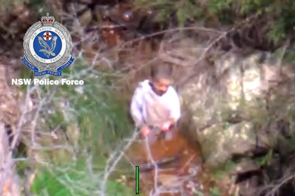 A PolAir helicopter pilot locates missing three-year-old boy Anthony “AJ” Elfalak in a creek bed on Monday morning.