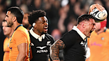 Codie Taylor of the All Blacks celebrates scoring a try.