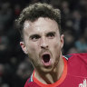 Liverpool cruise into knockout rounds as Atletico see red