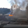 ‘Darkest days’ return to Solomon Islands as protesters burn buildings