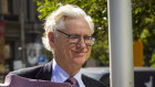 Seven executive Bruce McWilliam arrives at court to give evidence in ASIC's case against Harold Mitchell.