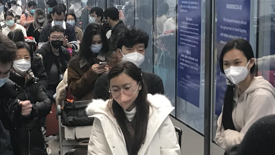 Inbound travellers can face long wait times for buses to leave for quarantine hotels and facilities from Guangzhou Baiyun Airport.