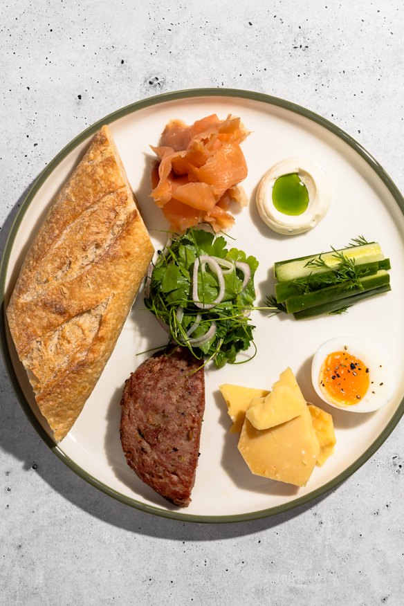 The breakfast plate includes Mr Cannubi salami cotto and aged gouda. 