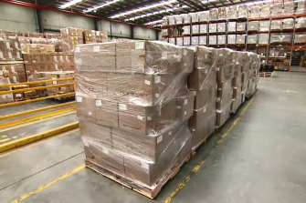 Some of the newly arrived three million rapid antigen tests, pictured in a Melbourne warehouse.