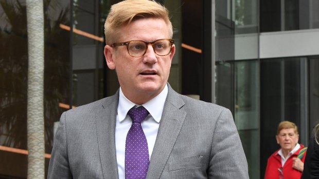 News Corp legal counsel Michael Cameron leaves the Federal Court in Sydney on Monday. 
