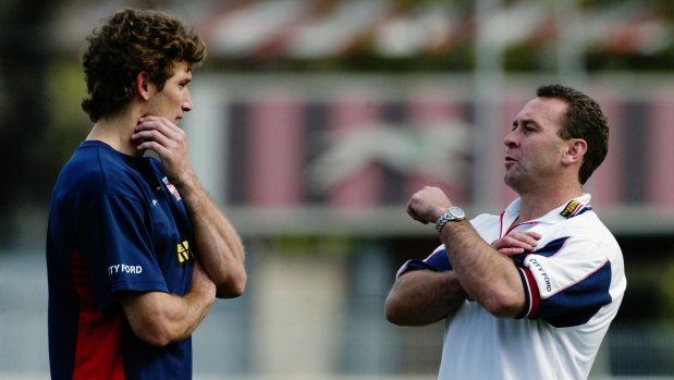 Ricky Stuart talks to Brett Mullins during the Roosters' 2002 premiership season.