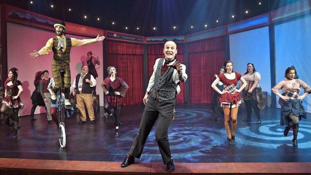 Greg Sollis (centre) is a 'likeable and touching' PT Barnum in Philo's production of <i>Barnum</i>.