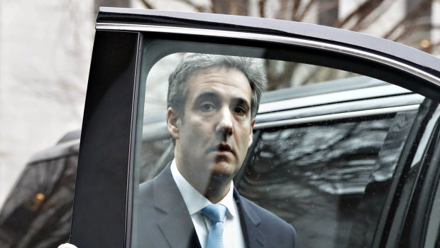 Cohen leaves the committee after testifying.